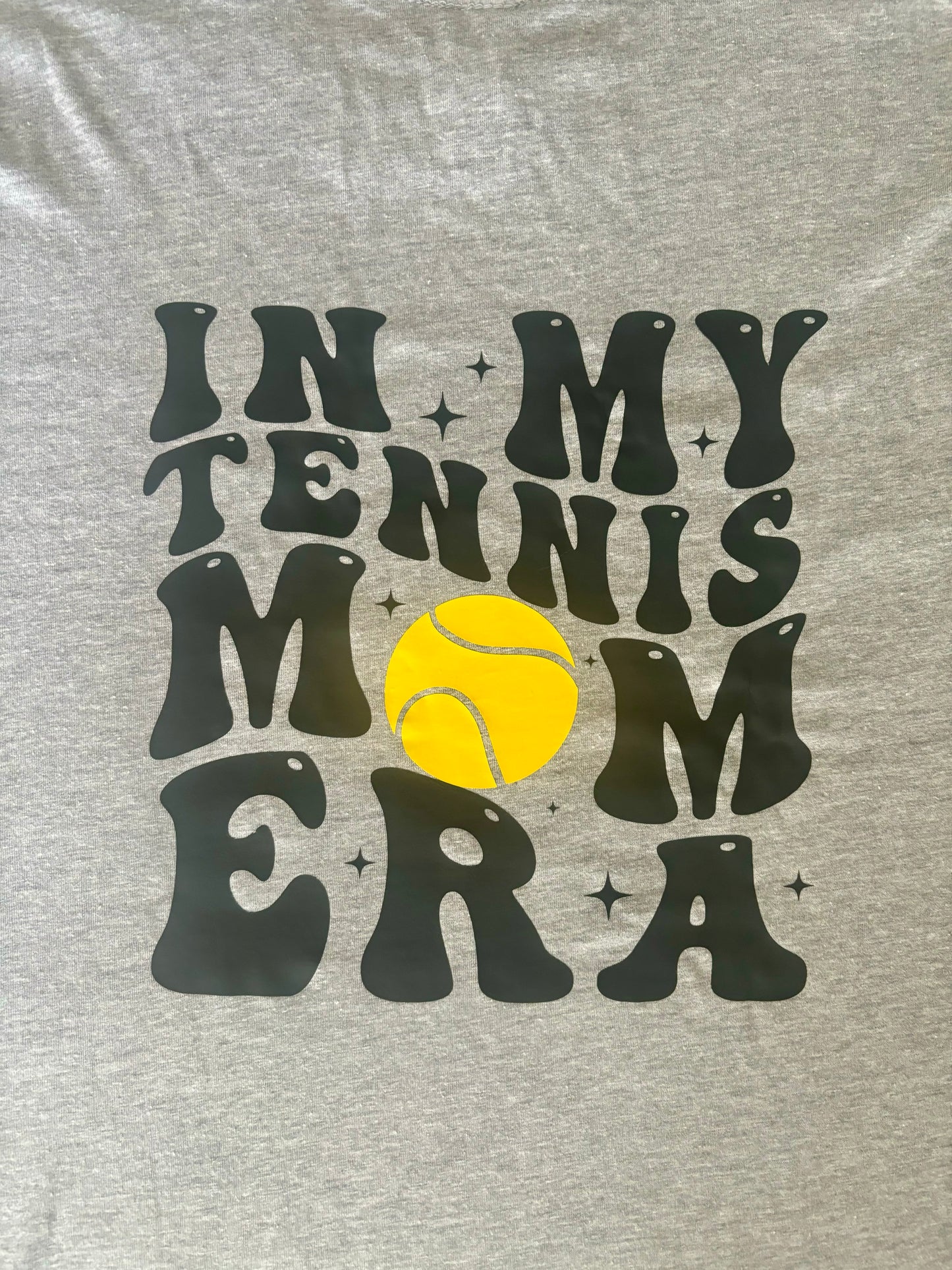 In my Tennis Mom Era t-shirt